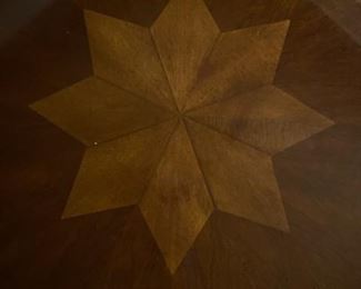 Round dining table with outer leaves.. OFF SITE