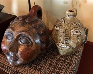 Mexican Tonala pottery woman’s head coin bank (left); Wisconsin Pottery grotesque face jug.