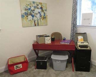 Small red desk, vintage typewriter, shredder