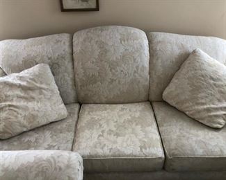 Sofa and love seat available.  Ivory damask fabric.