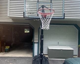 Portable Full sized basketball hoop with backboard good condition $225