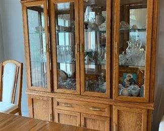  Oak China Cabinet with glass shelves , center drawer and lower cupboards