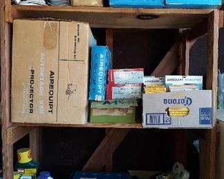 boxes with old slides and movie reels, old year books 