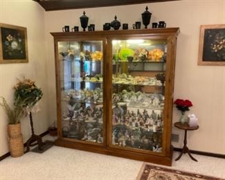 Huge curio cabinet, lighted. Will hold all of your collectibles.