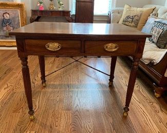 	#5	Henredon side table with 2 drawers and brass feet. 34"x22.5"x27.5"	SOLD		