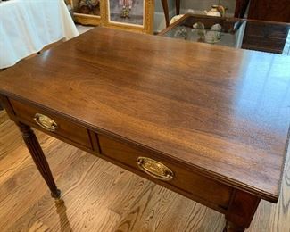 	#5	Henredon side table with 2 drawers and brass feet. 34"x22.5"x27.5"	SOLD		