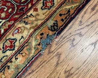 #121 Hand knotted rug. 105"x73" As is -edge SOLD