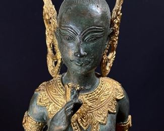 An Elongated Bronze Female Apsara Venerated Figure buy on StubbsEstates.com