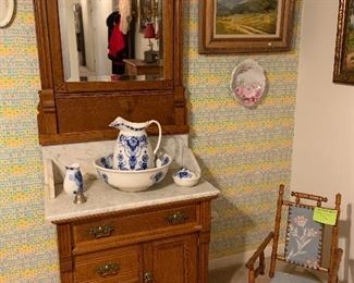 Eastlake washstand with marble top and carved mirror