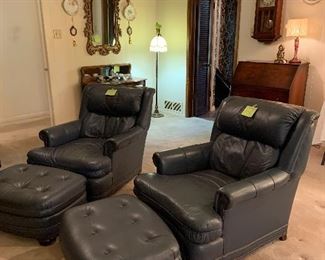 matching leather chairs with ottomans, by Leathermen's Guild. The actual color is a nice blue-gray