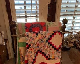 handmade quilts and brass quilt rack