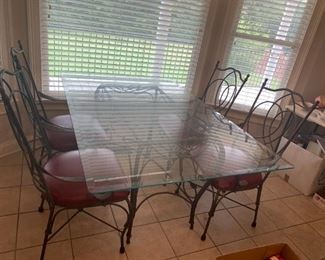 #1 Table Glass Top Table w/metal Base w/4 chairs 42x65x30 $ 175.00