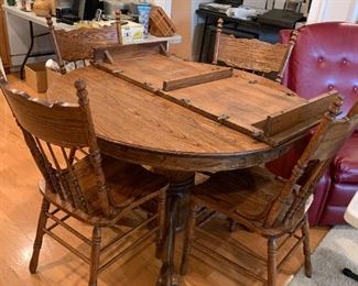 #50	Table	Oak Claw foot Pedistal Table w/1 leaf & 4 Chairs 48-69x30.5T (as is finish)	 $ 175.00 																						