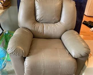 #58	Chair	Gray Leather Recliner (as is tear)	 $ 30.00 																						