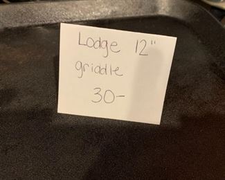 #142	kitchen	Lodge 12" griddle iron 	 $ 30.00 																						