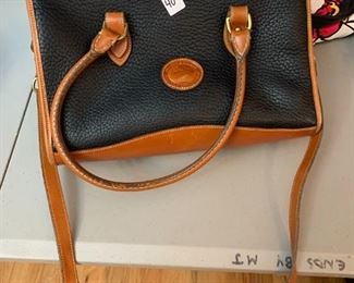 #157	purse	Dooney bourke brown and black purse 	 $ 40.00 																						