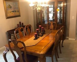 This elegant dining room comes with an extra leaf and 2 extra chairs seen in another photo $750 for the set