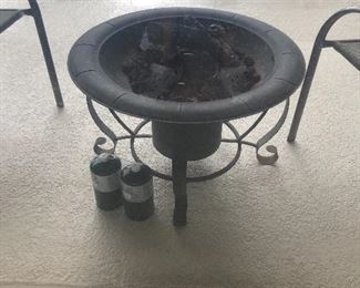 Propane fire pit with new canisters $60 for all