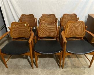 Set of 6 Arne Vodder teak and cane swing back chairs with brass hardware, $1995/set