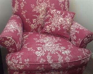 red toile upholsterd chair