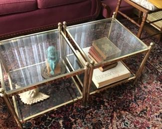 Glass and brass tables.  