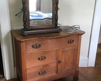 Washstand, mirror and cabinet.