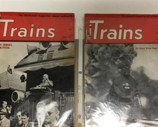 2 vintage train magazines in plastic.