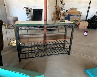 Metal and glass couch table , bar glass ware storage.