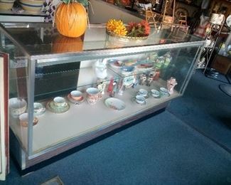 40. LARGER GLASS DISPLAY CASE $