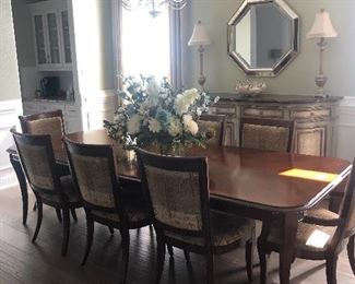 Fabulous dining room table and eight chairs. This includes two leaves for the table