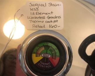 There are two large stainless cooking pots. Great for lobster or cooking for big parties