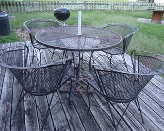 Wrought iron table with 4 chairs
