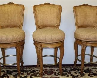 3 French carved swivel counter stools