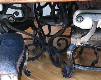 #1) - $1500 - Seville Home Copper Top Dining Table with 6 Chairs.  Each chair is solid wood with a leather seat bottom.  Table is 60 Inch in diameter.  Table new was $3500 and chairs were $400 each.  