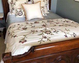 #19) - $750 - Solid Walnut Wood Queen Bed.  Seville Home new was $3000.   Headboard 64" Tall.  Footboard 32" Tall.  Mattress and Box Springs may be included if buyer would like it.  Linens are included including comforter, blankets, sheets, pillows and throw pillows.  