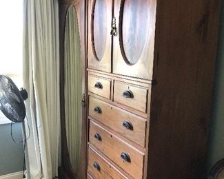 #21) - $750 - Antique Solid Wood Armoire.  Side Mirror Door Opens to a closet.  6 Drawers.  61" W x 20.5" D x 82"H.  