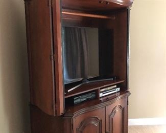 #22) - $750 - Antique Solid Walnut Armoire.  Matches Queen Bed (Item #   ).  Front Doors Close.  Seville Home $2800 New.  48" W x 28" D x 80"H.  