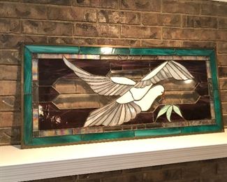 #101) - $200 - Custom Leaded glass made by Carol Lee Hahn of New Mexico.  44" x 22".  Small crack in one piece of the window.  