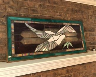 #101) - $200 - Custom Leaded glass made by Carol Lee Hahn of New Mexico.  44" x 22".  Small crack in one piece of the window.  