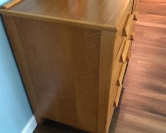 #107) - $450 - Solid Oak Air Force Issued Dresser Circa 1950's.  Dresser issued upon active service discharge.  36"W x 20"D x 23"H.  Lock on upper right drawer.  No Key.