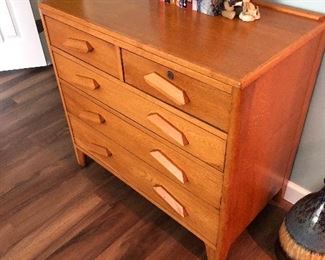 #107) - $450 - Solid Oak Air Force Issued Dresser Circa 1950's.  Dresser issued upon active service discharge.  36"W x 20"D x 23"H.  Lock on upper right drawer.  No Key.