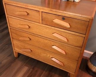 #107) - $450 - Solid Oak Air Force Issued Dresser Circa 1950's.  Dresser issued upon active service discharge.  36"W x 20"D x 23"H.  Lock on upper right drawer.  No Key.