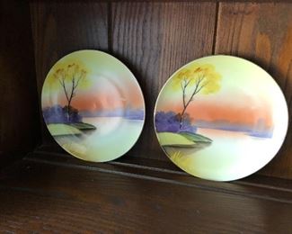 #108) - $70 - Set of 7 Hand Painted in Japan Meito China Plates.  