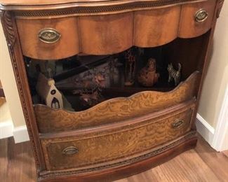 #116) - $250 - Solid Wood Decorative Cabinet.  Mirrored Center Opening.  Ornate Carving on each side.  35"W x 19"D x 27"H.