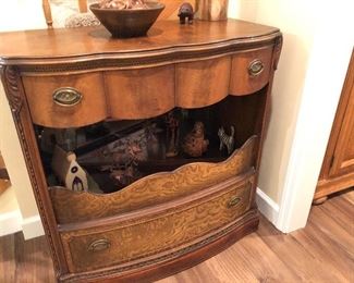 #116) - $250 - Solid Wood Decorative Cabinet.  Mirrored Center Opening.  Ornate Carving on each side.  35"W x 19"D x 27"H.