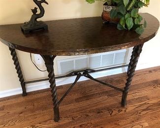#118) - $200 - Pounded Metal Half Round Table.  49"W x 20"D x 29"H.