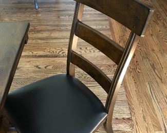 #100) - $750 - Solid wood table with 6 Chairs. 20 Inch leaf folds into table to expand an additional length.  Custom protective pads for entire table.  40" x 72" collapsed.  40" x 92" expanded.  