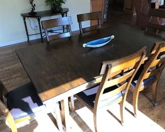#100) - $750 - Solid wood table with 6 Chairs. 20 Inch leaf folds into table to expand an additional length.  Custom protective pads for entire table.  40" x 72" collapsed.  40" x 92" expanded.  
