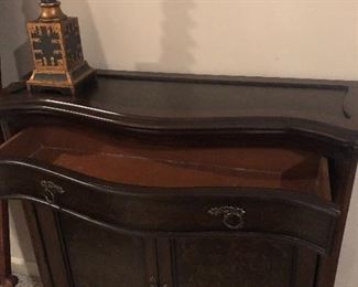 #7) - $200 - Wood Occasional Chest with 2 Shelves and a Drawer.  35"W x 12"D x 34" H.