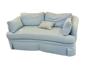 7. Upholstered Settee and Decorative Pillows